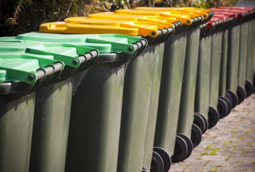Segregated waste bins for recyclable and non-recyclable materials on site